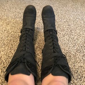 Women’s knee high lace up boots